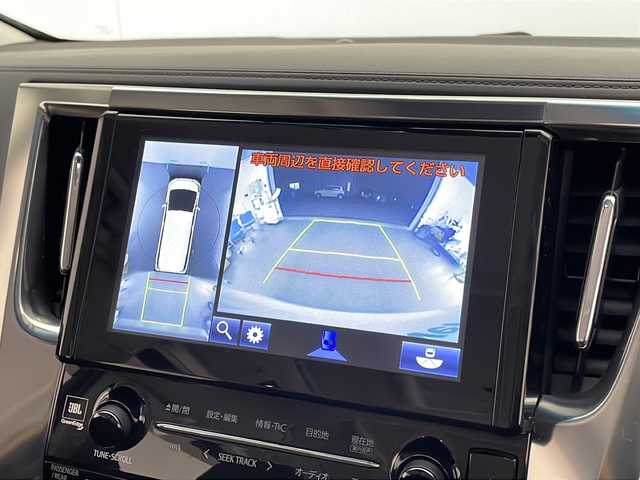 トヨタ ヴェルファイア Z Gエディション 宮崎県 2015(平27)年 6.2万km ホワイトパールクリスタルシャイン 禁煙車/プリクラッシュセーフティシステム/純正10.5型ディスプレイオーディオ/（AUX/HDMI/Bluetooth/FMAM/フルセグTV/ナビ）/純正13.3型リアフリップダウンモニター/純正JBLサウンドシステム/純正ビルトインDSRC ETC/純正キセノンオートライト/純正フォグ/純正18インチアルミ/純正フロアマット/アダプティブクルーズコントロール/黒本革シート/前席パワーシート/シートヒーター/エグゼクティブパワーシート/ウッドコンビ本革巻ハンドル/マホガニーウッドパネル/パワーバックドア/スマートキー/プッシュエンジンスタート/新車時保証書/取扱い説明書