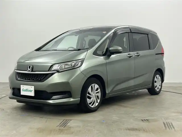 ホンダ フリード G ホンダセンシング 岡山県 2020(令2)年 5.7万km シルバーミストグリーンM 純正ナビ　/（CD/DVD/Ｂｌｕｅｔｏｏｔｈ/フルセグＴＶ)/衝突軽減ブレーキ　/両側電動スライド　/レーダークルーズコントロール　/ビルトインＥＴＣ　/LEDヘッドライト/バックカメラ　/ドライブレコーダー/プッシュスタート　/ＵＳＢ接続　/スマートキー/スペアキー/アイドリングストップ/ミュージックサーバー/ミュージックプレーヤー接続/純正フロアマット/純正アルミホイール