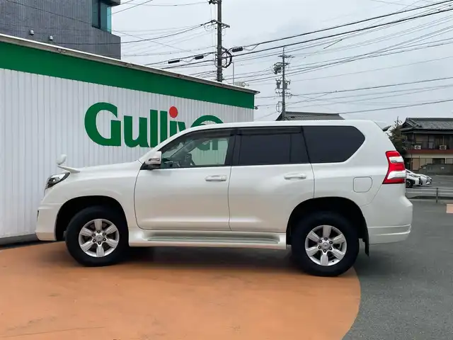 トヨタ ランドクルーザー プラド TX Lパッケージ 三重県 2016(平28)年 7.6万km ホワイトパールクリスタルシャイン ワンオーナー/BIGXメモリナビ/フルセグテレビ/バックカメラ/モデリスタフロントエアロ/サンルーフ/黒革シート/シートヒーター
