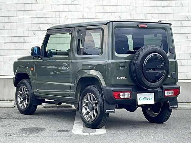 スズキ ジムニー XC 山形県 2022(令4)年 0.1万km ジャングルグリーン デュアルセンサーブレーキサポート/・後退時ブレーキサポート/・車線逸脱抑制制御機能/・車線逸脱警報機能/・パーキングソナー/・横滑り防止装置（ＥＳＰ）/純正ナビ/バックカメラ/ドライブレコーダー（ナビ連動前後）/シートヒーター/クルーズコントロール/ETC2.0/アイドリングストップ/純正アルミホイール/純正フロアマット/オートLEDライト/フォグライト/革巻きステアリング/ステアリングスイッチ/ミラーヒーター/スマートキー/スペアキー