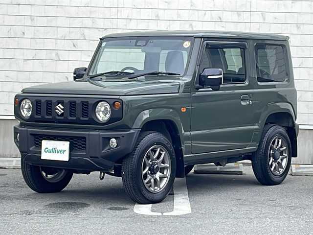 スズキ ジムニー XC 山形県 2022(令4)年 0.1万km ジャングルグリーン デュアルセンサーブレーキサポート/・後退時ブレーキサポート/・車線逸脱抑制制御機能/・車線逸脱警報機能/・パーキングソナー/・横滑り防止装置（ＥＳＰ）/純正ナビ/バックカメラ/ドライブレコーダー（ナビ連動前後）/シートヒーター/クルーズコントロール/ETC2.0/アイドリングストップ/純正アルミホイール/純正フロアマット/オートLEDライト/フォグライト/革巻きステアリング/ステアリングスイッチ/ミラーヒーター/スマートキー/スペアキー