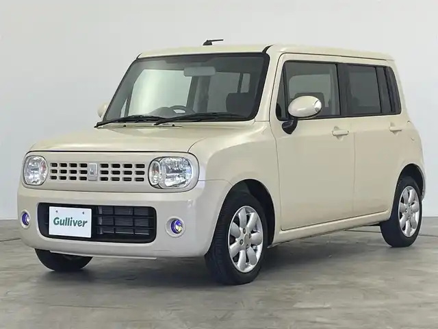 スズキ ラパン T Lパッケージ 群馬県 2010(平22)年 10万km ミルクティーベージュメタリック 禁煙車　純正CDデッキ　CD再生機能　オートライト　オートエアコン　プッシュスタート　スマートキー　純正フロアマット　フォグランプ　電動格納ミラー　純正アルミホイール　パワーウィンドウ　パワーステアリング