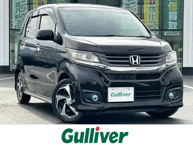 ホンダ Ｎ ＷＧＮ カスタム G ターボパッケージ 岡山県 2014(平26)年 6.1万km プレミアムゴールドパープルパール 登録時走行距離60222km/純正ナビ/地デジTV(AM/FM/CD/DVD/Bluetooth)/バックカメラ/ETC/衝突被害軽減システム/クルーズコントロール/ハーフレザーシート/横滑り防止装置/アイドリングストップ/オートライト/電動格納ミラー/純正15インチAW/プッシュスタート/スマートキー/純正フロアマット