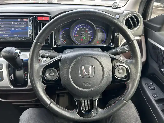 ホンダ Ｎ ＷＧＮ カスタム G ターボパッケージ 岡山県 2014(平26)年 6.1万km プレミアムゴールドパープルパール 登録時走行距離60222km/純正ナビ/地デジTV(AM/FM/CD/DVD/Bluetooth)/バックカメラ/ETC/衝突被害軽減システム/クルーズコントロール/ハーフレザーシート/横滑り防止装置/アイドリングストップ/オートライト/電動格納ミラー/純正15インチAW/プッシュスタート/スマートキー/純正フロアマット