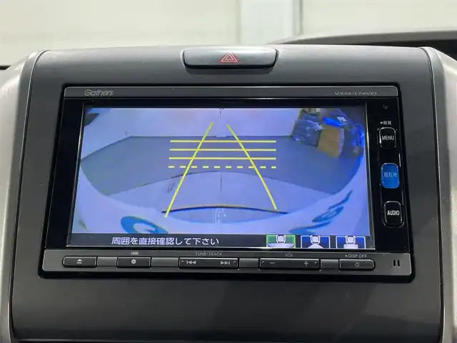 ホンダ フリード G ホンダセンシング 愛知県 2017(平29)年 7.7万km ホワイトオーキッドパール 純正ナビ【VXMー１７４VFi】/両側パワースライドドア/レーダークルーズコントロール/衝突軽減ブレーキ/車線逸脱警報/先行車発進告知/ビルトインＥＴＣ/アクセサリーソケット/ＥＣＯＮ/アイドリングストップ/ISOFIX/後席シェード/純正フロアマット