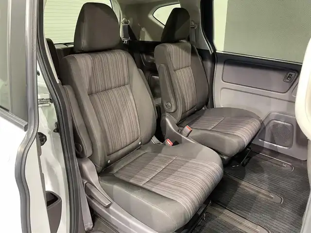 ホンダ フリード G ホンダセンシング 愛知県 2017(平29)年 7.7万km ホワイトオーキッドパール 純正ナビ【VXMー１７４VFi】/両側パワースライドドア/レーダークルーズコントロール/衝突軽減ブレーキ/車線逸脱警報/先行車発進告知/ビルトインＥＴＣ/アクセサリーソケット/ＥＣＯＮ/アイドリングストップ/ISOFIX/後席シェード/純正フロアマット