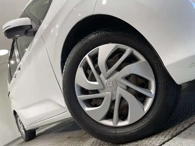 ホンダ フリード G ホンダセンシング 愛知県 2017(平29)年 7.7万km ホワイトオーキッドパール 純正ナビ【VXMー１７４VFi】/両側パワースライドドア/レーダークルーズコントロール/衝突軽減ブレーキ/車線逸脱警報/先行車発進告知/ビルトインＥＴＣ/アクセサリーソケット/ＥＣＯＮ/アイドリングストップ/ISOFIX/後席シェード/純正フロアマット