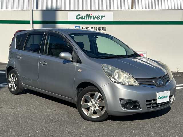 日産 ノート 15X 東京都 2009(平21)年 9万km ダイヤモンドシルバー 社外メモリナビ（AVIC-RZ201）/・TV/CD/DVD/USB/バックカメラ/盗難防止装置/電動格納ミラー/ドアバイザー/純正15インチアルミホイール/ETC/スペアキー1本