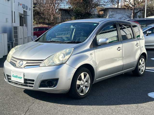日産 ノート 15X 東京都 2009(平21)年 9万km ダイヤモンドシルバー 社外メモリナビ（AVIC-RZ201）/・TV/CD/DVD/USB/バックカメラ/盗難防止装置/電動格納ミラー/ドアバイザー/純正15インチアルミホイール/ETC/スペアキー1本