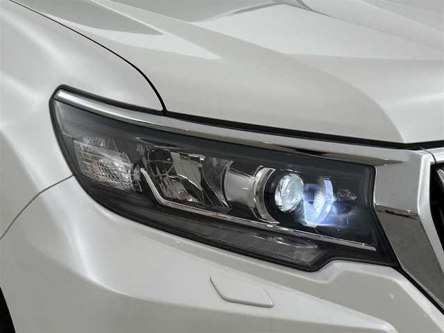 トヨタ ランドクルーザー プラド TX Lパッケージ 福岡県 2021(令3)年 9.4万km ホワイトパールクリスタルシャイン サンルーフ　/純正９型ナビ　/バックカメラ　/ビルトインＥＴＣ２．０　/前後ドラレコ　/レーダークルコン　/トヨタセーフティセンス/衝突軽減ブレーキ/レーンキープ/ヒルディセントコントロール/センターデフロック/本革シート/シートベンチレーション／ヒーター　/パワーシート/ＭＴモード付　/純正１９インチＡＷ/LEDヘッドライト