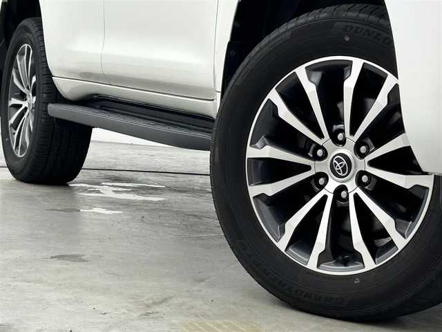 トヨタ ランドクルーザー プラド TX Lパッケージ 福岡県 2021(令3)年 9.4万km ホワイトパールクリスタルシャイン サンルーフ　/純正９型ナビ　/バックカメラ　/ビルトインＥＴＣ２．０　/前後ドラレコ　/レーダークルコン　/トヨタセーフティセンス/衝突軽減ブレーキ/レーンキープ/ヒルディセントコントロール/センターデフロック/本革シート/シートベンチレーション／ヒーター　/パワーシート/ＭＴモード付　/純正１９インチＡＷ/LEDヘッドライト