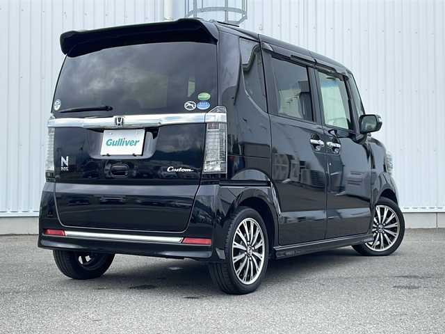 ホンダ Ｎ ＢＯＸ カスタム G ターボ Lパッケージ 愛媛県 2016(平28)年 5.7万km スマートブラック 純正SDナビ/バックカメラ/ETC/Bluetooth/フルセグTV/両側パワースライドドア/パドルシフト/純正フロアマット/純正15インチAW/ハーフレザーシート/オートHIDヘッドライト/LEDフォグランプ/スマートキー/スペアキー/アイドリングストップ/プッシュスタート/横滑り防止装置