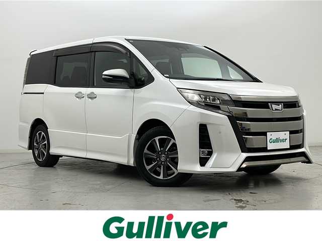 トヨタ ノア Si ダブルバイビーⅡ 宮城県 2019(平31)年 6.2万km ホワイトパールクリスタルシャイン 禁煙車/両側パワースライドドア/Toyota Safety Sense/・プリクラッシュセーフティ/・レーントレーシングアシスト/・クルーズコントロール/・オートマチックハイビーム/・パーキングサポートブレーキ/純正9型ナビ/・BT.CD.DVD.USB/フルセグTV/バックカメラ/ソナー(F.R)/ビルトインETC/ドライブレコーダー(F)/ハーフレザーシート/プッシュスタート/スマートキー×２/アイドリングストップ/LEDヘッドライト/フォグランプ/ロールサンシェード