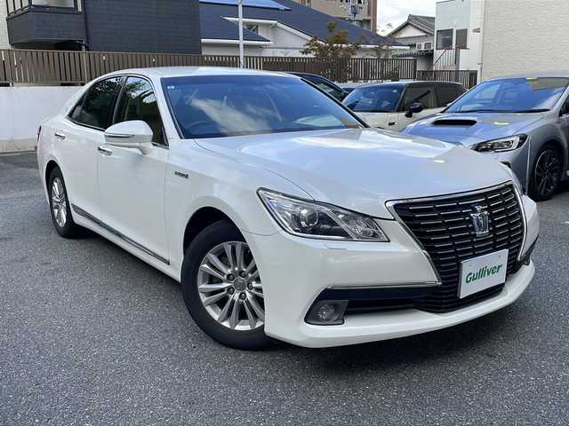 トヨタ クラウン ハイブリッド ロイヤルサルーンG 福岡県 2013(平25)年 9.5万km ホワイトパールクリスタルシャイン メーカーHDDナビ/フルセグTV//CD/DVD/BT/バックカメラ/ベージュ革パワーシート/エアシート/ヒーター/ビルトインETC/リアオートシェード/純正16インチＡＷ/スマートキーｘ２/カードキー/エンジンプッシュスタート/保証書/取扱説明書/スペアキー