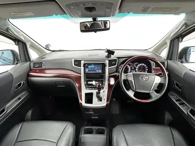 トヨタ アルファード 240S 大分県 2009(平21)年 8.7万km ブラック 純正HDDナビ/（フルセグ/CD/DVD/Bluetooth）/フリップダウンモニター/バックカメラ/黒革調シートカバー/両側パワースライドドア/ステアリングスイッチ/スマートキープッシュスタート/電動格納ミラー/オートライト/純正アルミホイール
