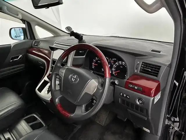 トヨタ アルファード 240S 大分県 2009(平21)年 8.7万km ブラック 純正HDDナビ/（フルセグ/CD/DVD/Bluetooth）/フリップダウンモニター/バックカメラ/黒革調シートカバー/両側パワースライドドア/ステアリングスイッチ/スマートキープッシュスタート/電動格納ミラー/オートライト/純正アルミホイール