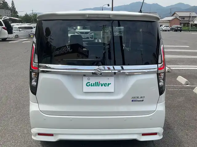 スズキ ソリオ HV MZ 滋賀県 2022(令4)年 3.6万km ピュアホワイトP 全方位モニター付ナビ装着車/ワンオーナー /純正15インチアルミホイール/両側パワースライドドア/純正メーカーOP9インチナビゲーション/・CD/DVD/・AM/FM/・Bluetooth/全方位モニター/純正ETC/ヘッドアップディスプレイ/前後ドライブレコーダー/前席シートヒーター/クルーズコントロール/スペアキー/取扱説明書/保証書/