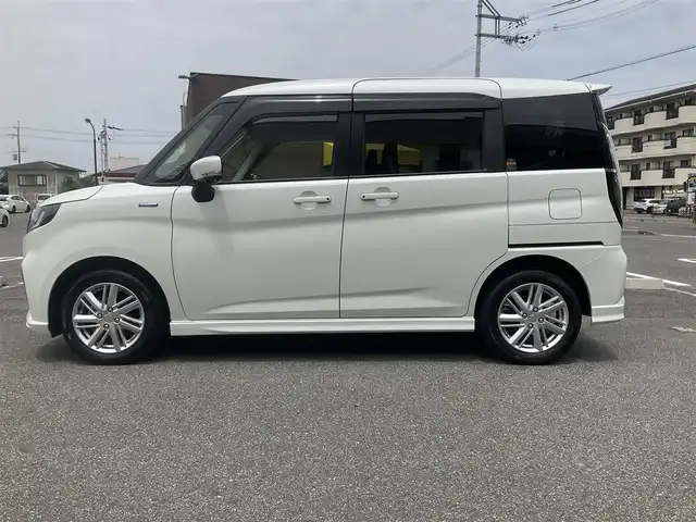 スズキ ソリオ HV MZ 滋賀県 2022(令4)年 3.6万km ピュアホワイトP 全方位モニター付ナビ装着車/ワンオーナー /純正15インチアルミホイール/両側パワースライドドア/純正メーカーOP9インチナビゲーション/・CD/DVD/・AM/FM/・Bluetooth/全方位モニター/純正ETC/ヘッドアップディスプレイ/前後ドライブレコーダー/前席シートヒーター/クルーズコントロール/スペアキー/取扱説明書/保証書/