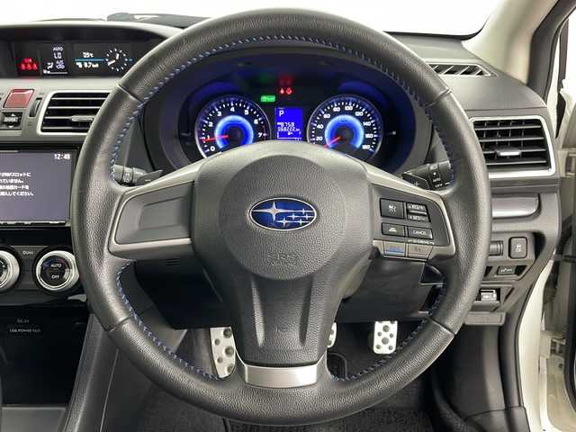 スバル インプレッサ スポーツ HV 2．0i-S アイサイト 道央・札幌 2015(平27)年 6.9万km クリスタルホワイトP ・４ＷＤ/・社外ナビ＆TＶ＆ＢＴ＆ＤＶＤ＆ＣＤ＆ＵＳＢ/・アイサイトＶｅｒ２/・車線逸脱警報/・横滑り防止機能/・ヒルスタートアシスト/・社外ＥＴＣ/・パドルシフト/・前席パワーシート/・Ｓｉドライブ/・オートライト/・HIDヘッドライト/・ドアミラーヒーター