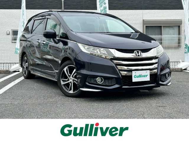 ホンダ オデッセイ アブソルート 三重県 2014(平26)年 9.9万km プレミアムヴィーナスブラックP 登録時98178km/ディーラーナビ（フルセグＴＶ／ＦＭ／ＡＭ／ＣＤ／ＤＶＤ／ＵＳＢ／ＨＤＭＩ）/両側パワースライドドア/ビルドインETC/クルーズコントロール/パドルシフト/バックカメラ/フルフラットシート/後部席モニター/ハーフレザー(黒)/AUTOライト/純正フロアマット/ステアリングスイッチ/革巻ステアリング/電格ミラー/三列シート/ウォークスルー/フォグランプ/ドアバイザー