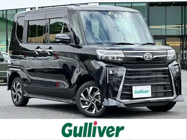 ダイハツ タント カスタム X 島根県 2022(令4)年 2.7万km ブラックマイカメタリック 登録時走行距離　27077km/ディスプレイオーディオ/(Bluetooth/HDMI/AppleCarplay/AndroidAUTO)/バックカメラ/前後ドライブレコーダー/コーナーセンサー/オートホールド/アイドリングストップ/両側電動スライドドア/ハーフレザー/シートヒーター/純正１４インチＡＷ/スペアキー×1/スマートアシスト/衝突回避支援ブレーキ機能/衝突警報機能/ブレーキ制御付誤発進抑制機能/車線逸脱警報機能/車線逸脱抑制制御機能/路側逸脱警報機能/ふらつき警報/先行車発進お知らせ機能/標識認識機能（進入禁止／最高速度／一時停止）/アダプティブドライビングビーム/コーナーセンサー/ETC