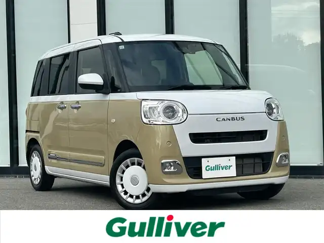 ダイハツ ムーヴ キャンバス ストライプス G 大阪府 2022(令4)年 3.1万km シャイニングホワイトパール/サンドベージュメタリック スマートアシスト　/純正９インチディスプレイオーディオ　/　フルセグＴＶ／ＢＴ／ＨＤＭＩ／/　ＵＳＢ／アップルカープレイ　/バックカメラ　/両側電動パワースライドドア　/シートヒーター/置くだけ充電スポット　/ETC　/前後ドライブレコーダー　