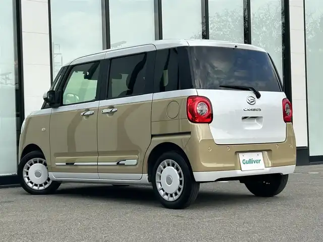 ダイハツ ムーヴ キャンバス ストライプス G 大阪府 2022(令4)年 3.1万km シャイニングホワイトパール/サンドベージュメタリック スマートアシスト　/純正９インチディスプレイオーディオ　/　フルセグＴＶ／ＢＴ／ＨＤＭＩ／/　ＵＳＢ／アップルカープレイ　/バックカメラ　/両側電動パワースライドドア　/シートヒーター/置くだけ充電スポット　/ETC　/前後ドライブレコーダー　