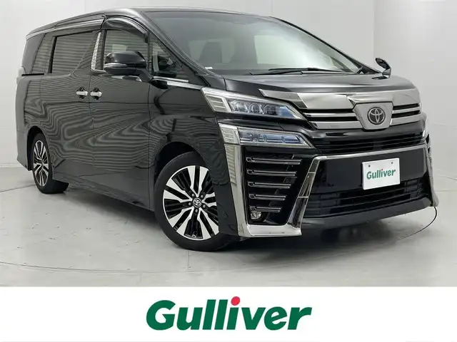 トヨタ ヴェルファイア Z Gエディション 茨城県 2020(令2)年 3.8万km ブラック 純正ディスプレイオーディオ/・AM/FM/CD/DVD/Bluetooth/フリップダウンモニター/バックカメラ/ビルトインETC/ドライブレコーダー（前後）/レーダークルーズコントロール/衝突軽減ブレーキ/レーンキープアシスト/ブラインドスポットモニター/横滑り防止装置/盗難防止装置/電動パーキングブレーキ/両側パワースライド/前後コーナーセンサー/メモリシート（D席）/パワーシート（D席+N席）/エアシート（D席+N席）/シートヒーター（D席+N席）/LEDヘッドライト/オートマチックハイビーム/オートライト/ダブルオートエアコン/プッシュスタートボタン/ステアリングリモコン/純正18インチアルミホイール/12V充電器/USBジャック/純正フロアマット/ドアバイザー