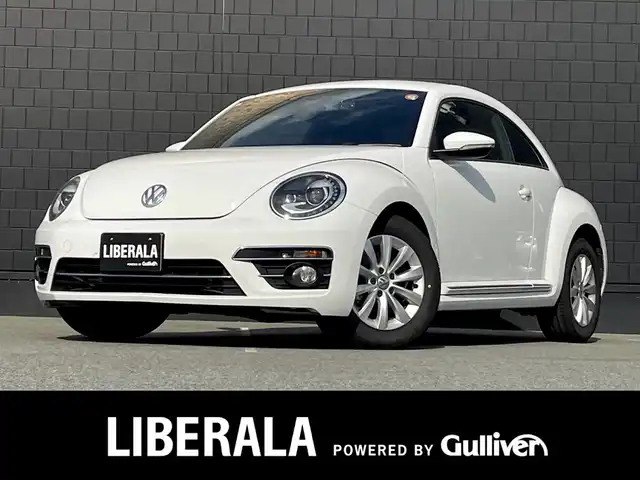 フォルクスワーゲン ザ・ビートル デザイン 三重県 2017(平29)年 5万km ピュアホワイト レザーＰＫＧ　/黒革　/シートヒーター　/純正ナビ　/Ｂｌｕｅｔｏｏｔｈ　/バックカメラ　/ＥＴＣ　/前後ドライブレコーダー　/スマートキー　/プッシュスタート　/ＨＩＤヘッドライト　/オートライト　/純正１６インチアルミ　/ＵＳＢ