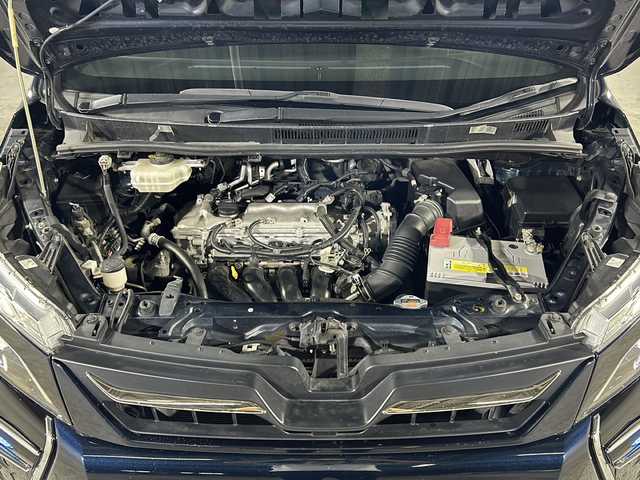 トヨタ ヴォクシー ZS 煌 沖縄県 2016(平28)年 9.2万km ブラッキッシュアゲハガラスフレーク 禁煙車/県外仕入れ/純正９インチナビ/【CD/DVD/フルセグTV/BT】/バックカメラ/１１インチ後席フリップダウンモニター/ETC/両側パワースライドドア/TRDフロントエアロ/トヨタセーフティセンス/→プリクラッシュセーフティ/→レーンディパーチャーアラート/→オートマチックハイビーム/USBポート/革調シートカバー/純正ヘッドライト/１８インチモデリスタアルミ/スマートキー