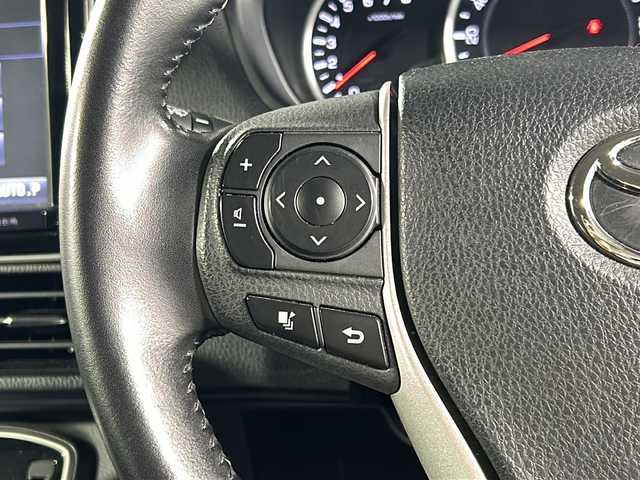 トヨタ ヴォクシー ZS 煌 沖縄県 2016(平28)年 9.2万km ブラッキッシュアゲハガラスフレーク 禁煙車/県外仕入れ/純正９インチナビ/【CD/DVD/フルセグTV/BT】/バックカメラ/１１インチ後席フリップダウンモニター/ETC/両側パワースライドドア/TRDフロントエアロ/トヨタセーフティセンス/→プリクラッシュセーフティ/→レーンディパーチャーアラート/→オートマチックハイビーム/USBポート/革調シートカバー/純正ヘッドライト/１８インチモデリスタアルミ/スマートキー