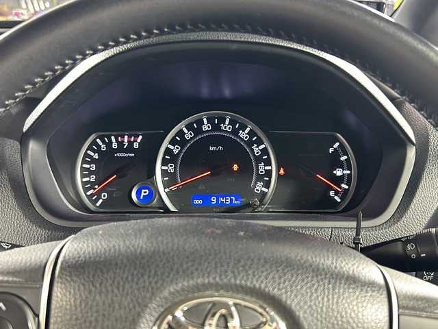 トヨタ ヴォクシー ZS 煌 沖縄県 2016(平28)年 9.2万km ブラッキッシュアゲハガラスフレーク 禁煙車/県外仕入れ/純正９インチナビ/【CD/DVD/フルセグTV/BT】/バックカメラ/１１インチ後席フリップダウンモニター/ETC/両側パワースライドドア/TRDフロントエアロ/トヨタセーフティセンス/→プリクラッシュセーフティ/→レーンディパーチャーアラート/→オートマチックハイビーム/USBポート/革調シートカバー/純正ヘッドライト/１８インチモデリスタアルミ/スマートキー