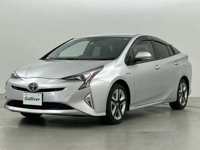トヨタ プリウス A ツーリングセレクション 福岡県 2016(平28)年 2.1万km シルバーM 純正ナビ（ＢＴ，フルセグＴＶ）　/バックカメラ　/ビルトインＥＴＣ　/前方ドラレコ　/ＡＣＣ　/コーナーセンサー　/衝突被害軽減ブレーキ　/レーンキープ　/ＰＫＳＢ　/ＢＳＭ　/ＨＵＤ　/パーキングアシスト　/シートヒーター