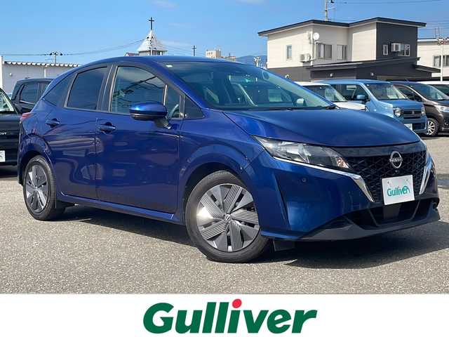 日産 ノート X FOUR 秋田県 2022(令4)年 9.3万km オーロラフレアブルーパール 純正ナビ/純正Bluetooth/フルセグ/全方位カメラ/ETC2.0/４WD/前後コーナーセンサー/前席シートヒーター/ステアリングヒーター