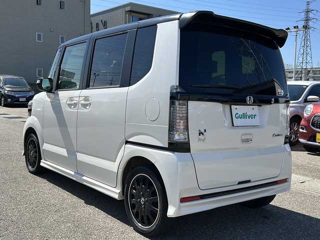ホンダ Ｎ ＢＯＸ カスタム ターボ SSパッケージ 石川県 2016(平28)年 6万km プレミアムホワイトパールⅡ ワンオーナー/純正メモリナビ/　（Bluetooth/CD/DVD/フルセグTV）/両側パワースライドドア/ハーフレザーシート/前席シートヒーター/ビルトインETC/前後ドライブレコーダー/クルーズコントロール/キセノンライト/スマートキー