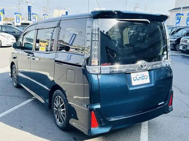 トヨタ ヴォクシー ZS 煌 岡山県 2015(平27)年 14.2万km ブラッキッシュアゲハガラスフレーク (株)IDOMが運営する【じしゃロン岡山店】の自社ローン対象車両になります。こちらは現金ご利用時の価格です。自社ローンご希望の方は別途その旨お申付け下さい。/・純正ナビゲーション/・バックカメラ/・両側電動スライドドア/・ドラレコ/・ＥＴＣ/・コーナーセンサー