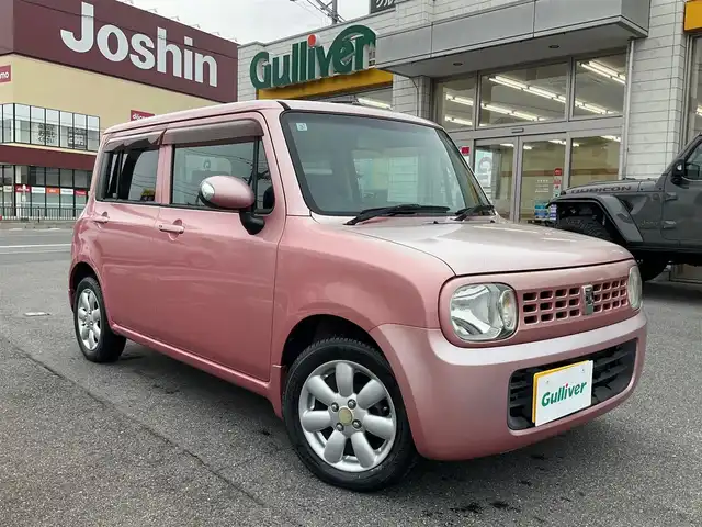 スズキ ラパン X 滋賀県 2009(平21)年 7.8万km チェリーピンクパールメタリック ・車検8年3月まで/・社外7インチナビ/CD、ワンセグテレビ/・純正フロアマット/・光軸調整ダイヤル/・ウィンカーミラー/・ドアバイザー/・プッシュスタート/・アクセサリーソケット/・スペアキー有り/・取扱説明書/・保証書