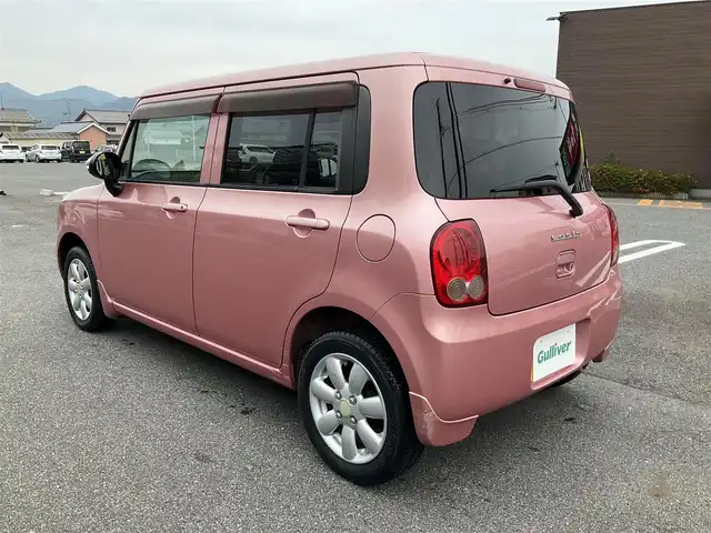 スズキ ラパン X 滋賀県 2009(平21)年 7.8万km チェリーピンクパールメタリック ・車検8年3月まで/・社外7インチナビ/CD、ワンセグテレビ/・純正フロアマット/・光軸調整ダイヤル/・ウィンカーミラー/・ドアバイザー/・プッシュスタート/・アクセサリーソケット/・スペアキー有り/・取扱説明書/・保証書