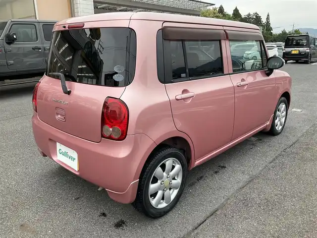 スズキ ラパン X 滋賀県 2009(平21)年 7.8万km チェリーピンクパールメタリック ・車検8年3月まで/・社外7インチナビ/CD、ワンセグテレビ/・純正フロアマット/・光軸調整ダイヤル/・ウィンカーミラー/・ドアバイザー/・プッシュスタート/・アクセサリーソケット/・スペアキー有り/・取扱説明書/・保証書