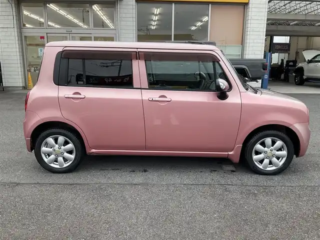 スズキ ラパン X 滋賀県 2009(平21)年 7.8万km チェリーピンクパールメタリック ・車検8年3月まで/・社外7インチナビ/CD、ワンセグテレビ/・純正フロアマット/・光軸調整ダイヤル/・ウィンカーミラー/・ドアバイザー/・プッシュスタート/・アクセサリーソケット/・スペアキー有り/・取扱説明書/・保証書