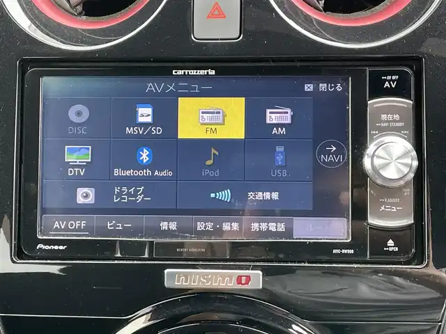 日産 ノート ニスモ 香川県 2018(平30)年 6.7万km ブリリアントホワイトパール nismoロゴ入りブラックスエード調スポーツシート/社外ナビ（AVIC-RW900）/　CD/DVD/Bluetooth/フルセグ/バックカメラ/ナビ連動ドラレコ（前方）/純正アルミホイール/レーンキープアシスト/エマージェンシーブレーキ/レベライザー/リアフォグ