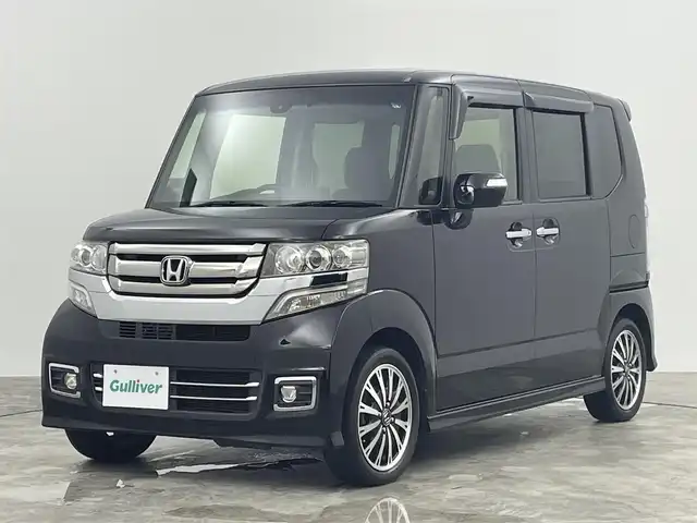 ホンダ Ｎ ＢＯＸ カスタム G ターボ Lパッケージ 群馬県 2016(平28)年 6.6万km スマートブラック 純正７インチナビ　バックカメラ　両側パワースライドドア　クルーズコントロール　ＨＩＤオートライト　ハーフレザーシート　純正１５インチＡＷ　ステアリングリモコン　ＥＴＣ　スマートキー　ドラレコ　禁煙車