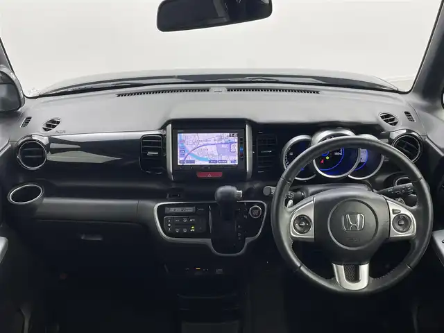 ホンダ Ｎ ＢＯＸ カスタム G ターボ Lパッケージ 群馬県 2016(平28)年 6.6万km スマートブラック 純正７インチナビ　バックカメラ　両側パワースライドドア　クルーズコントロール　ＨＩＤオートライト　ハーフレザーシート　純正１５インチＡＷ　ステアリングリモコン　ＥＴＣ　スマートキー　ドラレコ　禁煙車