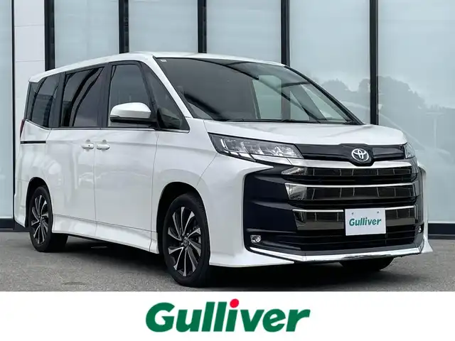 トヨタ ノア ハイブリッド S－Z 大阪府 2024(令6)年 1.1万km ホワイトパールクリスタルシャイン トヨタセーフティセンス/純正10.5ディスプレイオーディオ/・フルセグTV/USB/BT/DVD/HDMI/快適利便パッケージ/バックカメラ/両側パワースライドドア/前後ドライブレコーダー/ビルトインETC2.0/オットマン/パワーバックドア/AC100V電源/ハーフレザーシート/シートヒーター/前後コーナーセンサー/純正フロアマット/純正17インチAW/LEDヘッド・フォグ/スペアキー/取説