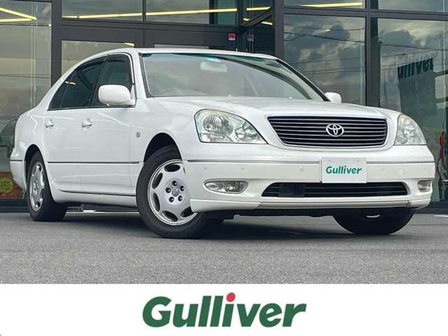トヨタ セルシオ Cタイプ Fパッケージ 愛媛県 2000(平12)年 11.6万km ホワイトパールクリスタルシャイン 純正ナビ/サンルーフ/本革(エクリュ)シート/全席パワーシート/全席シートヒーター/前席シートベンチレーション/レーダークルーズコントロール(ブレーキ制御付)/クリアランスソナー/シートメモリー機能/マークレビンソンプレミアムサウンドシステム/スマートキーシステム/リヤ大型センターアームレスト/電動チルト＆テレスコピック機構/本木目ステアリングホイール＆本木目シフトノブ/クールボックス/純正フロアマット/スペアキー1本/ETC/現状サマー(純正AW)(225/60/R16)/DUNLOP VEURO VE302 /禁煙車