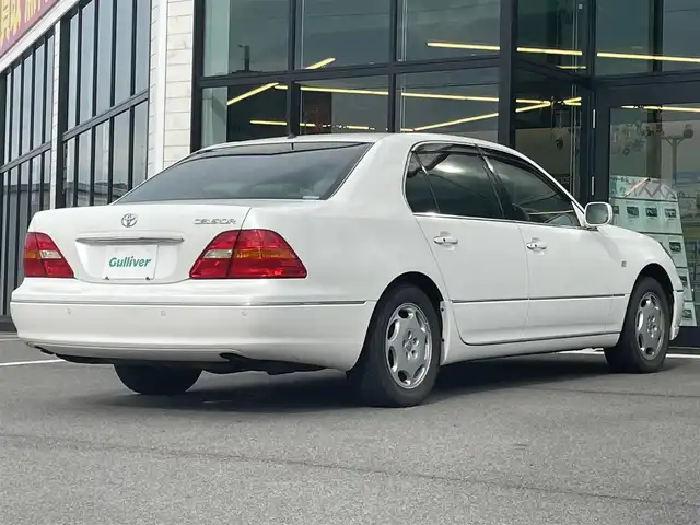トヨタ セルシオ Cタイプ Fパッケージ 愛媛県 2000(平12)年 11.6万km ホワイトパールクリスタルシャイン 純正ナビ/サンルーフ/本革(エクリュ)シート/全席パワーシート/全席シートヒーター/前席シートベンチレーション/レーダークルーズコントロール(ブレーキ制御付)/クリアランスソナー/シートメモリー機能/マークレビンソンプレミアムサウンドシステム/スマートキーシステム/リヤ大型センターアームレスト/電動チルト＆テレスコピック機構/本木目ステアリングホイール＆本木目シフトノブ/クールボックス/純正フロアマット/スペアキー1本/ETC/現状サマー(純正AW)(225/60/R16)/DUNLOP VEURO VE302 /禁煙車