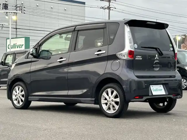 三菱 ｅＫカスタム G 岡山県 2013(平25)年 6.8万km パープリッシュネイビーパール 登録時走行距離67689km/純正ナビ/フルセグTV(AM/FM/CD/Bluetooth)/バックカメラ/前後ドライブレコーダー/ETC/アイドリングストップ/電動格納ミラー/純正フロアマット/14インチ純正AW/プッシュスタート/スマートキー(スペア×1)