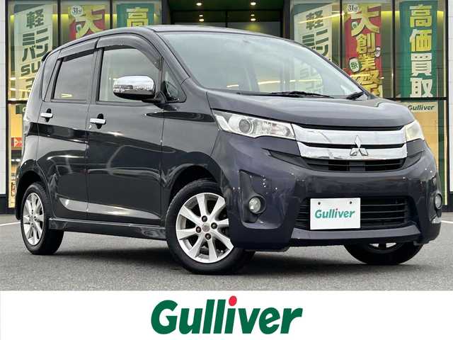 三菱 ｅＫカスタム G 岡山県 2013(平25)年 6.8万km パープリッシュネイビーパール 登録時走行距離67689km/純正ナビ/フルセグTV(AM/FM/CD/Bluetooth)/バックカメラ/前後ドライブレコーダー/ETC/アイドリングストップ/電動格納ミラー/純正フロアマット/14インチ純正AW/プッシュスタート/スマートキー(スペア×1)