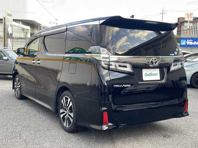 トヨタ ヴェルファイア Z Gエディション 兵庫県 2019(平31)年 3.8万km ブラック ワンオーナー/保証書・取説・有/社外メモリーナビ・フルセグ・BT・CD・DVD・FM・AM/バックカメラ/ETC/追尾機能付きクルーズコントロール/車線逸脱防止支援システム/衝突被害軽減ブレーキ/パーキングアシストブレーキ/クリアランスソナー/ロードサインアシスト/先行車発進通知/後席モニター/シートヒーター/シートクーラー/プッシュスタート/スマートキー×2/社外フロアマット/純正ドアバイザー
