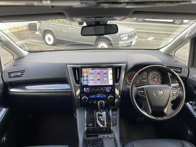 トヨタ ヴェルファイア Z Gエディション 兵庫県 2019(平31)年 3.8万km ブラック ワンオーナー/保証書・取説・有/社外メモリーナビ・フルセグ・BT・CD・DVD・FM・AM/バックカメラ/ETC/追尾機能付きクルーズコントロール/車線逸脱防止支援システム/衝突被害軽減ブレーキ/パーキングアシストブレーキ/クリアランスソナー/ロードサインアシスト/先行車発進通知/後席モニター/シートヒーター/シートクーラー/プッシュスタート/スマートキー×2/社外フロアマット/純正ドアバイザー